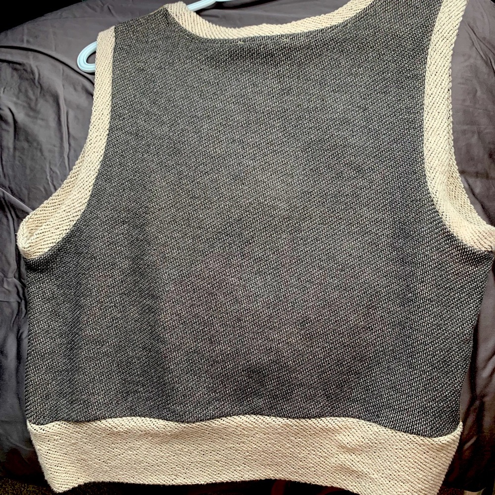 Beautiful earth toned vest! Wear over an oversized button up or buy itself!